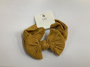 Twisted Fabric bow headband  -  Mustard